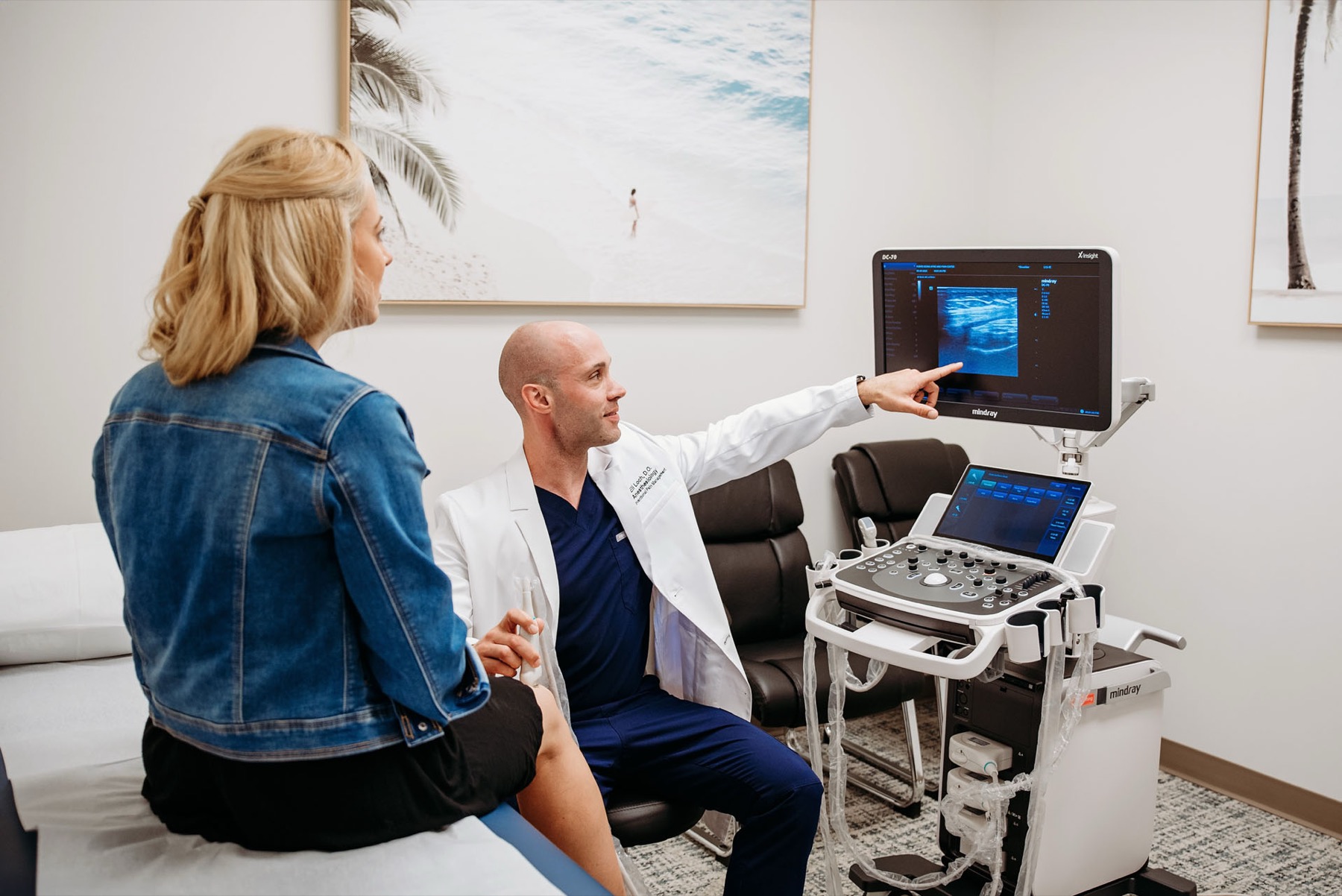 Dr. Loch performing a diagnostic ultrasound examination with a patient